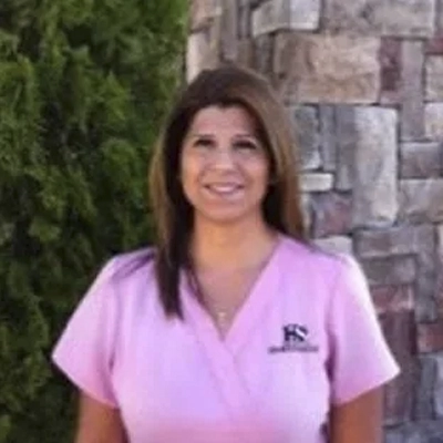 A headshot of Angela Henderson, a massage therapist at Getwell Chiropractic.